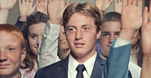 Photo illustration depicting young Jorg Klebingat at a church meeting for prospective seminary students.