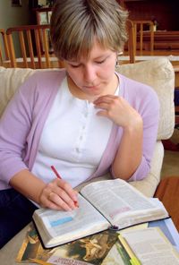 young woman studying scriptures
