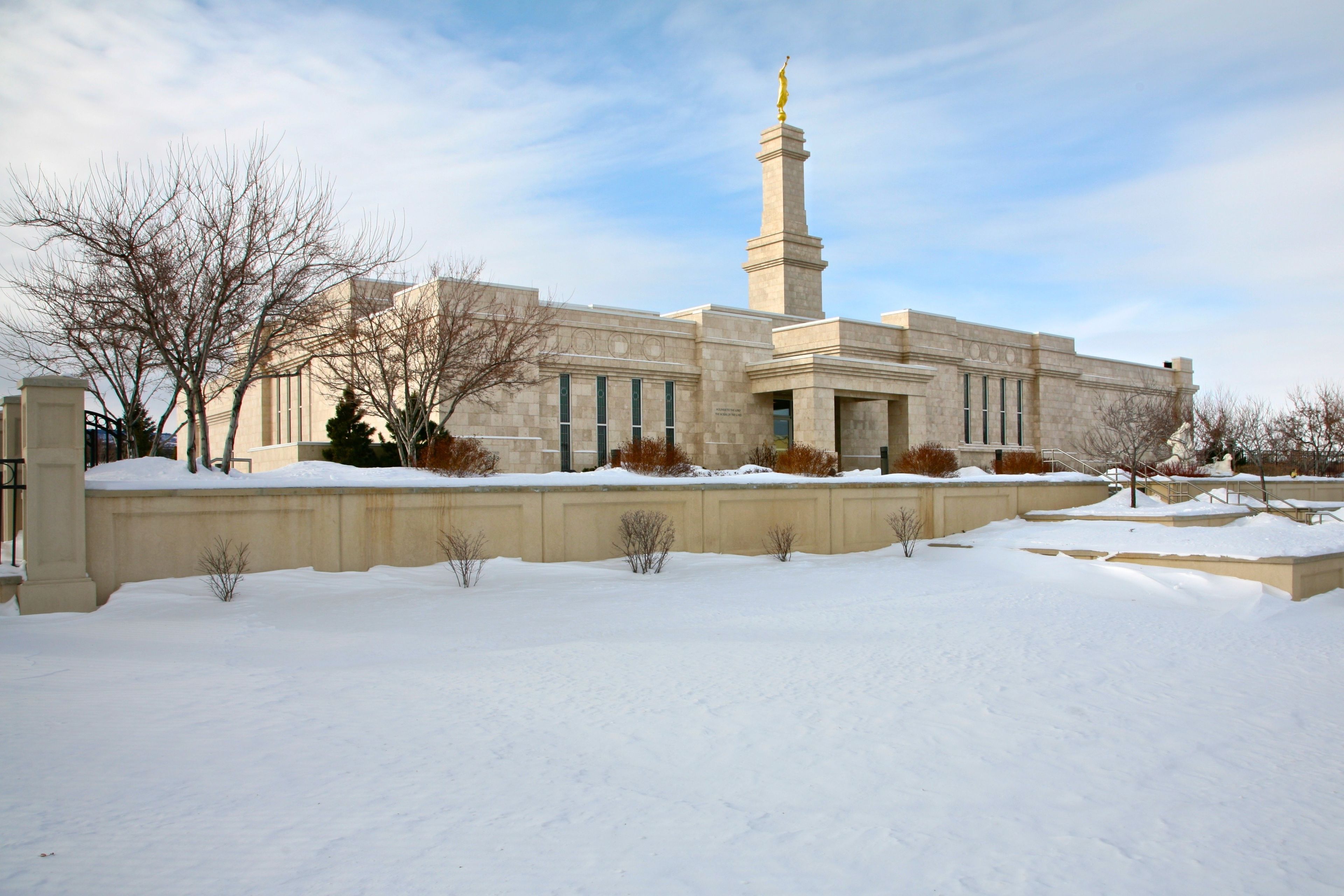 The Monticello Utah Temple in the winter, including the entrance and scenery.