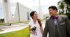 newlyweds in front of temple