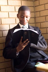 youth studying scriptures