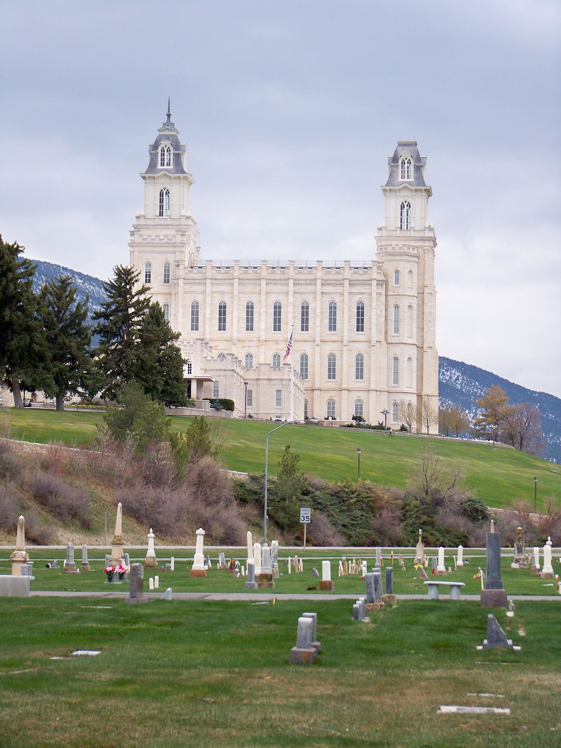 The Manti Utah Temple, including the entrance and cemetery.