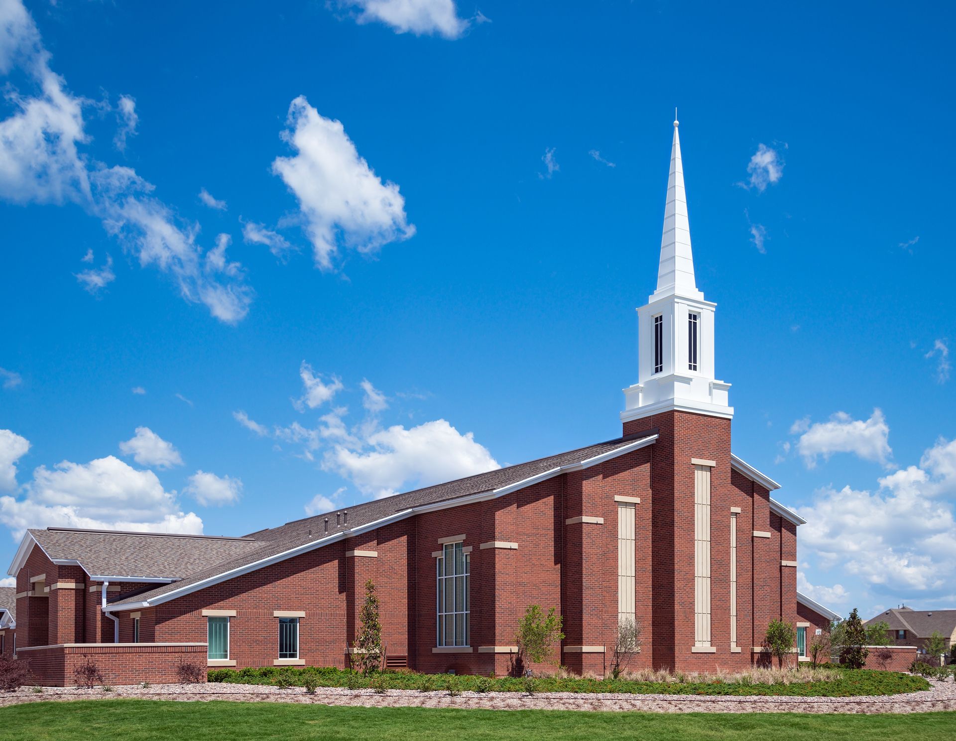 A brick meetinghouse with a white steeple. © undefined ipCode 1.