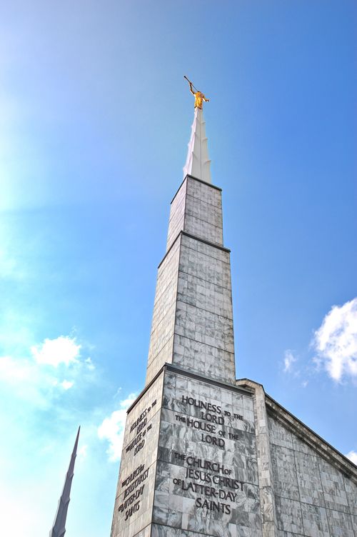 The spire of the Dallas Texas Temple, with the words “Holiness to the Lord: The House of the Lord” and the Church’s name in view.