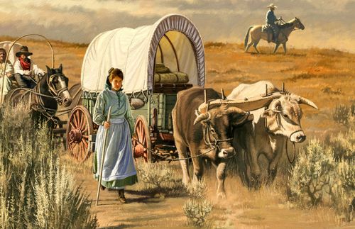 woman walking beside a wagon