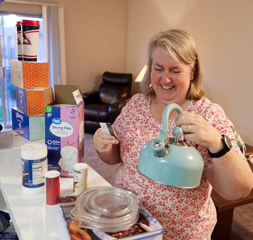 woman pouring tea