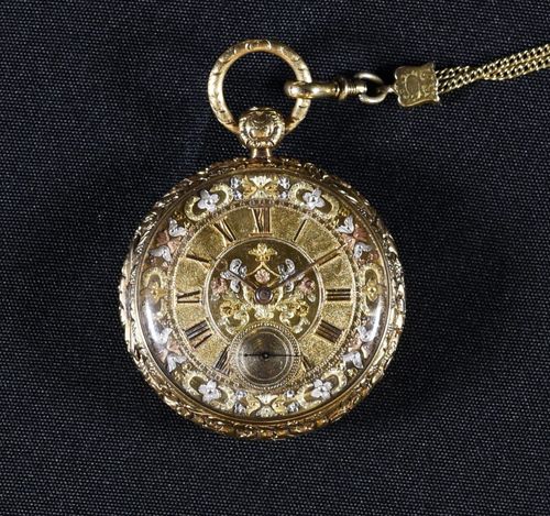 Photograph of an ornate pocket watch