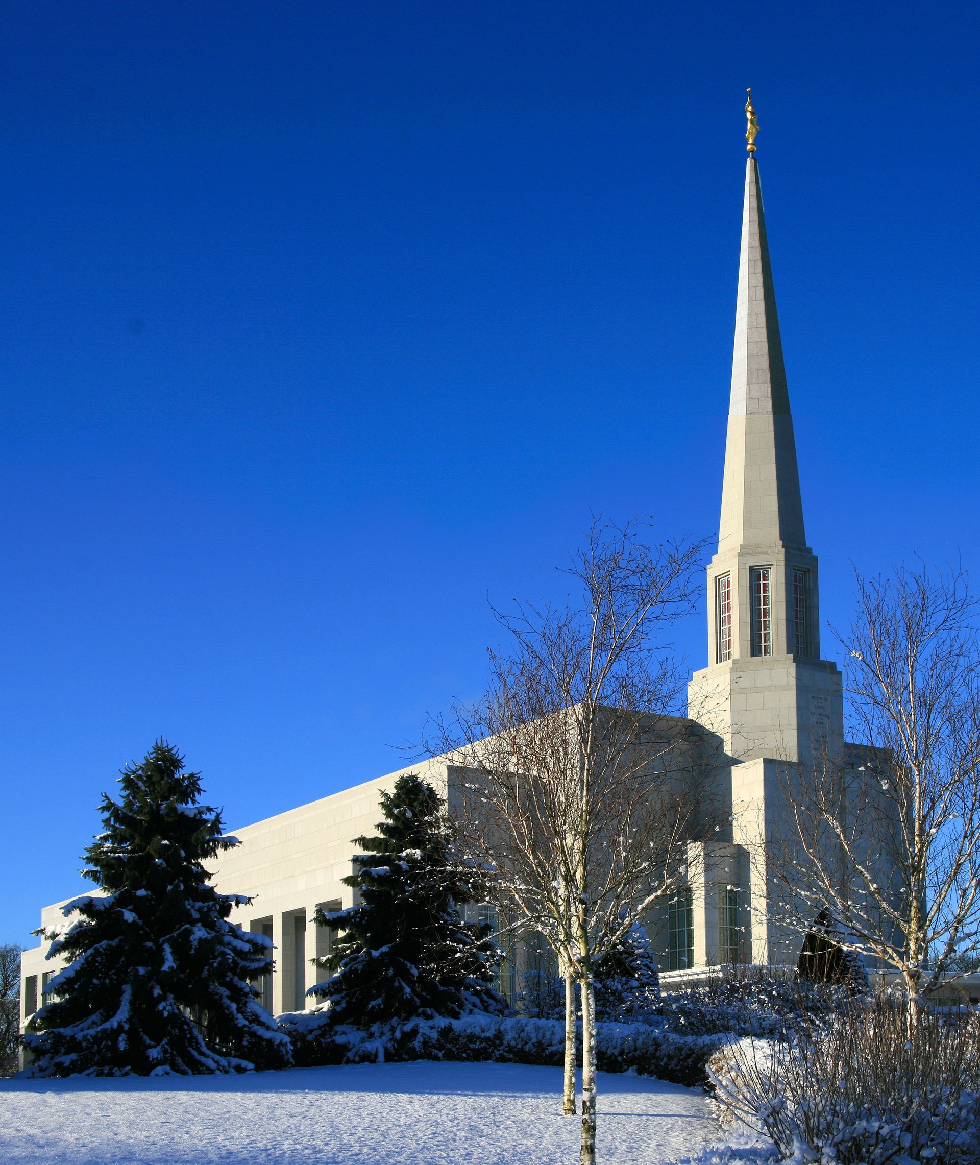 The Preston England Temple in the winter, including scenery.