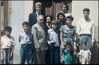 group of people outside missionary home