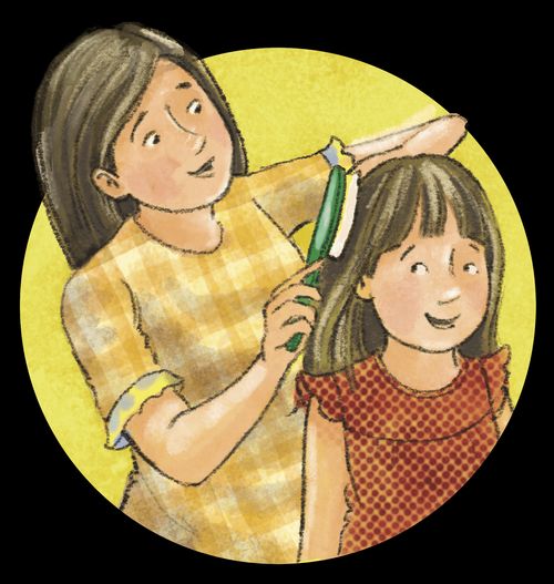 Mom brushing daughter’s hair