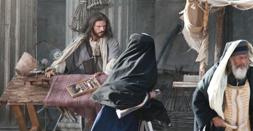 Jesus turning over moneychangers’tables