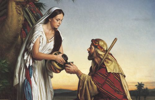 Rebekah pouring water into a cup held by the servant of Abraham