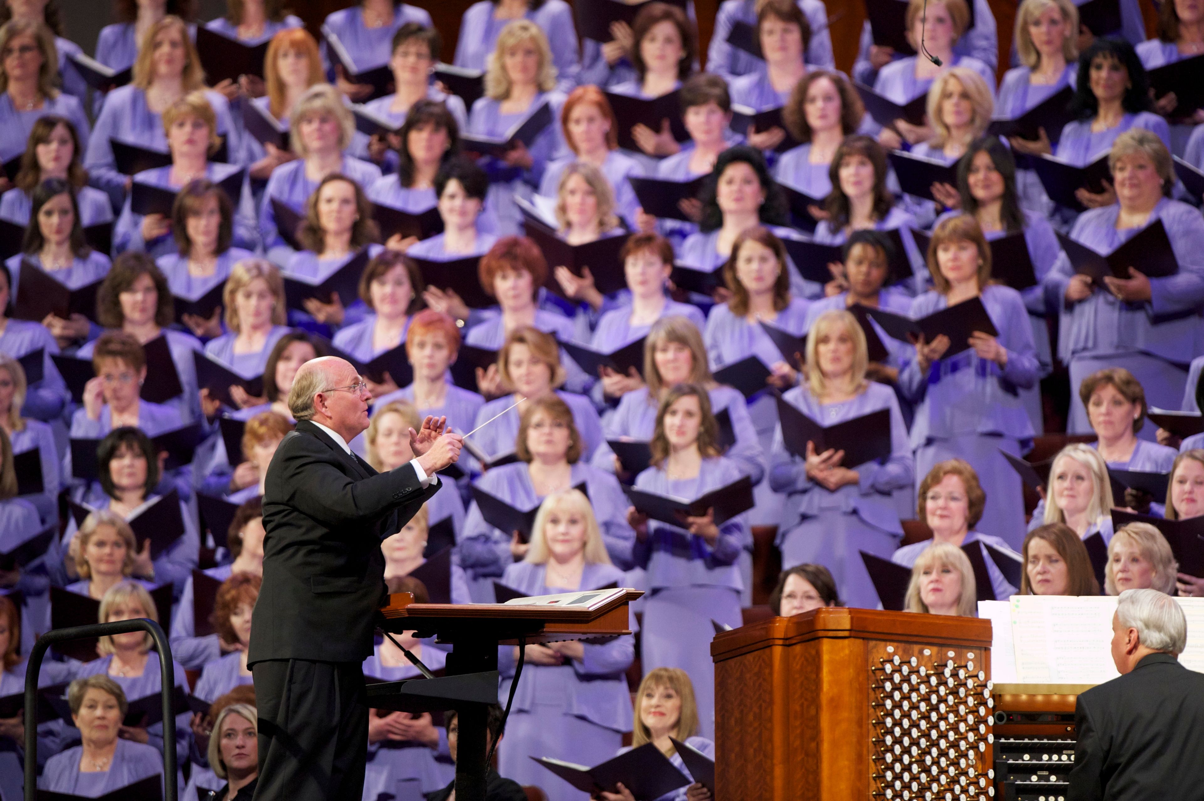The Mormon Tabernacle Choir conductor leads the choir during general conference.