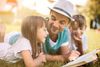 father reading to children