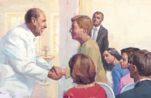 President Monson greeting members in the temple
