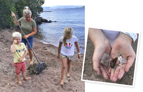 family picking up trash