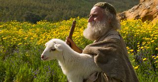 shepherd with a lamb