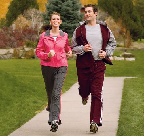 man and woman jogging