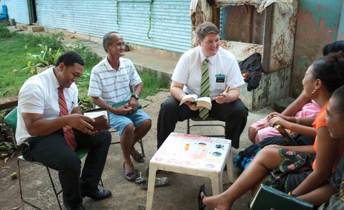 missionaries teaching investigators