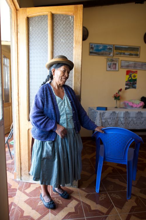 smiling woman wearing a hat