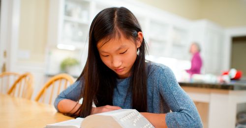 young woman reading scriptures