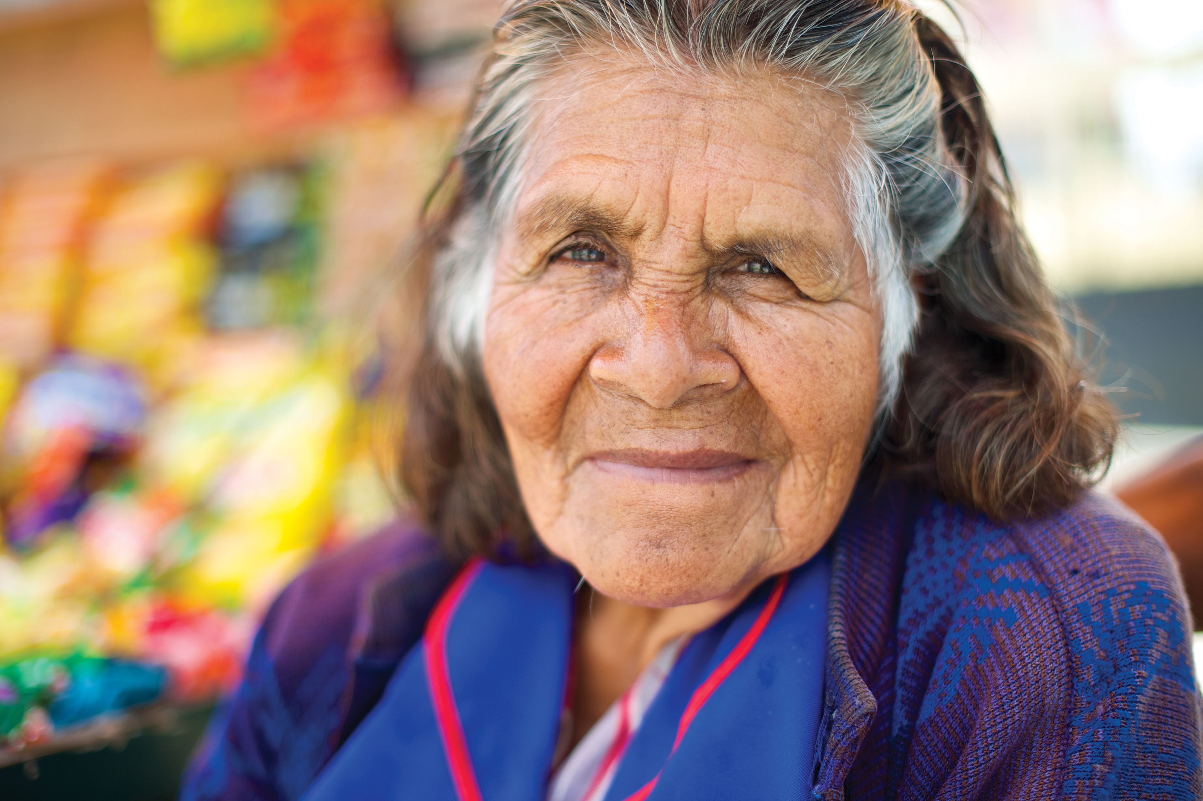 An informal portrait of an elderly woman in Peru.