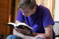 teen studying the scriptures