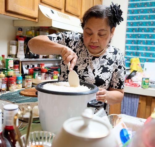 woman making rice