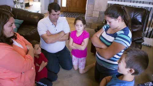 family praying