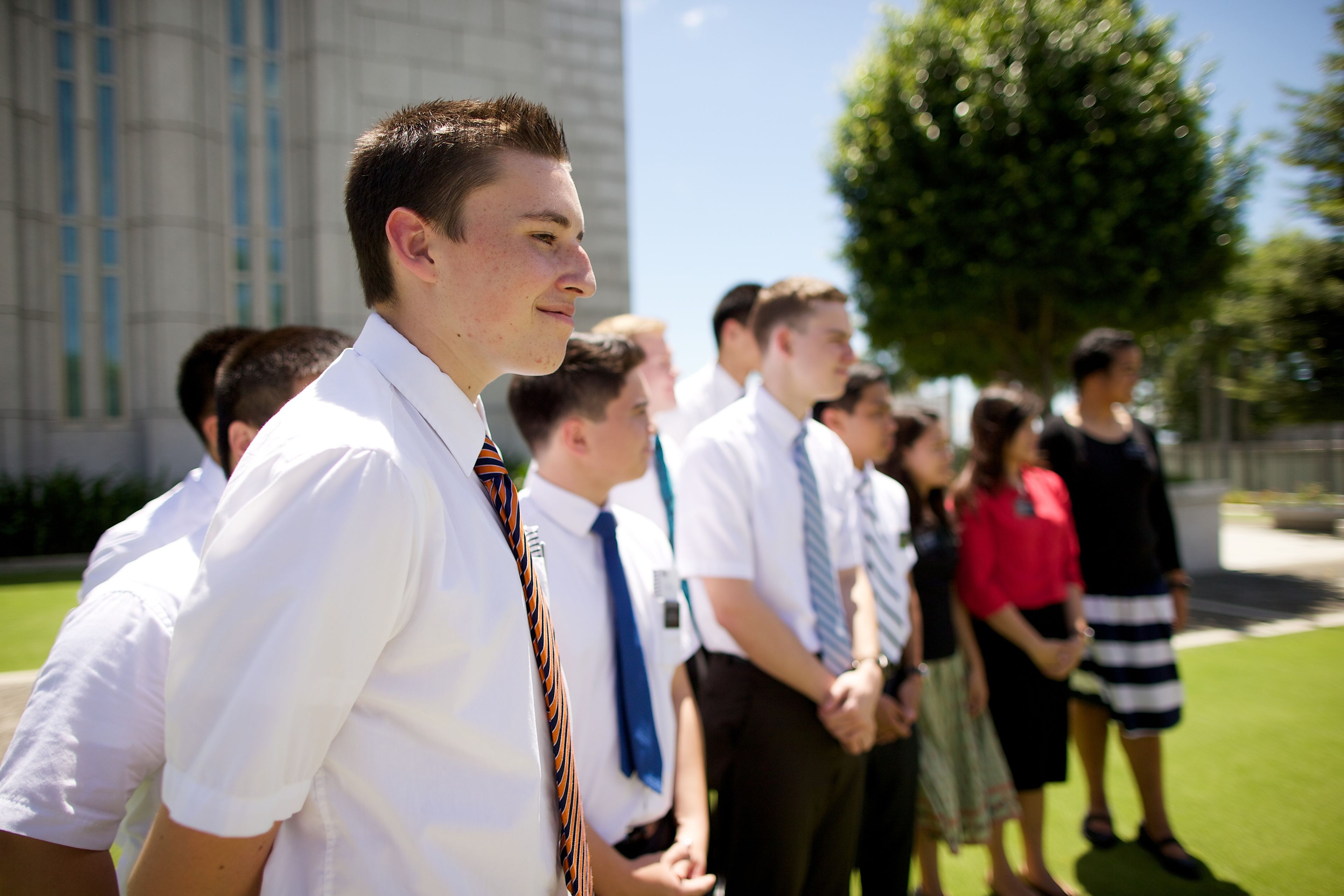 Missionaries standing in a line outside the Cebu City Philippines Temple.