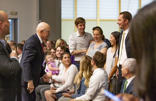 President Oaks speaking with young adults