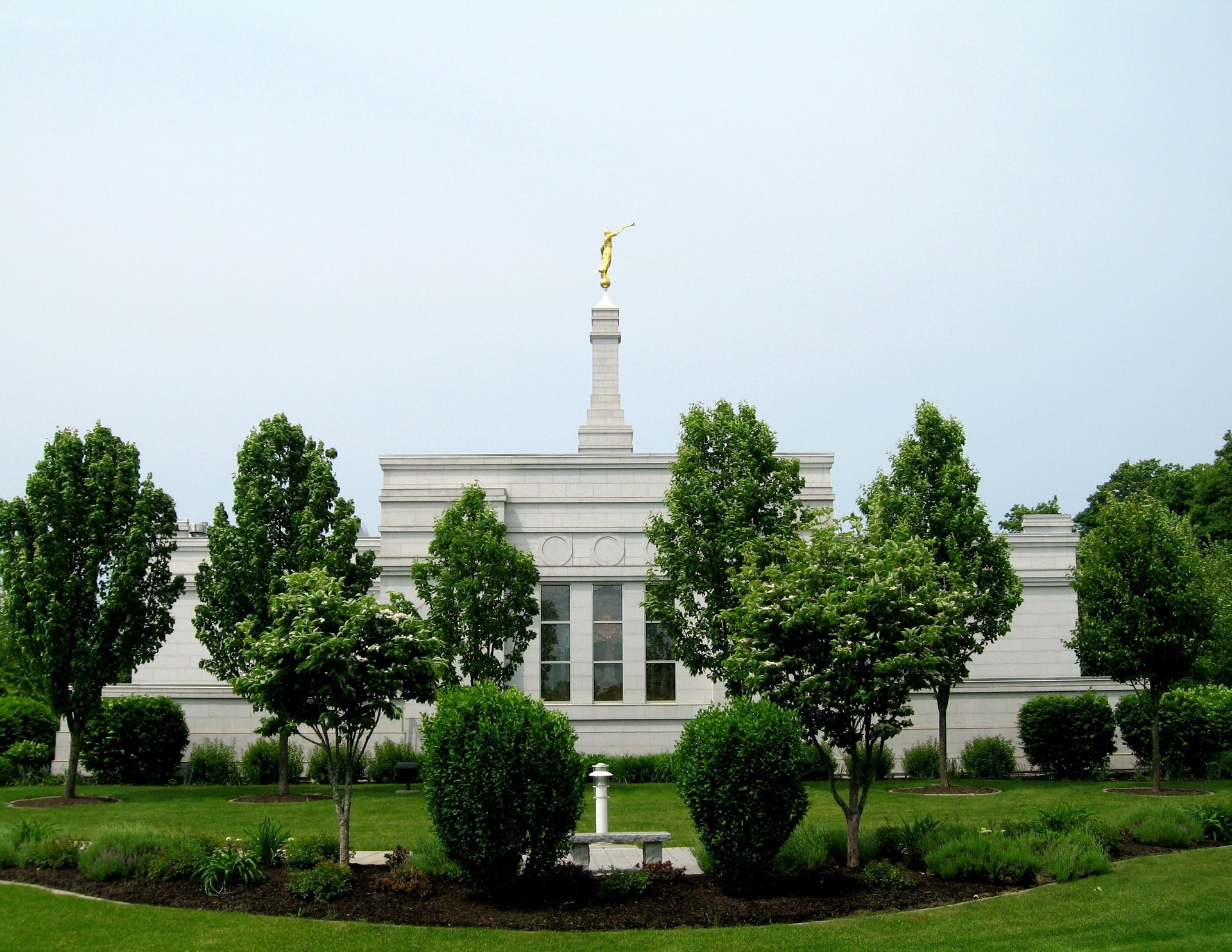 The Palmyra New York Temple side view, including scenery.