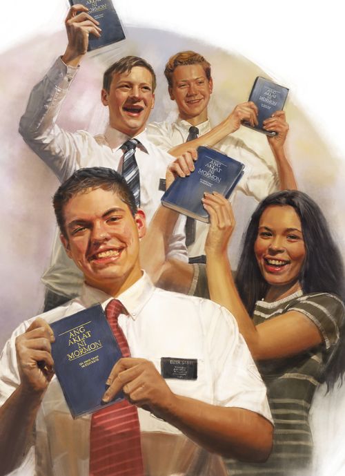 missionaries holding the Book of Mormon