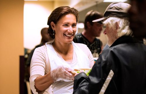 Woman serving at a homeless shelter