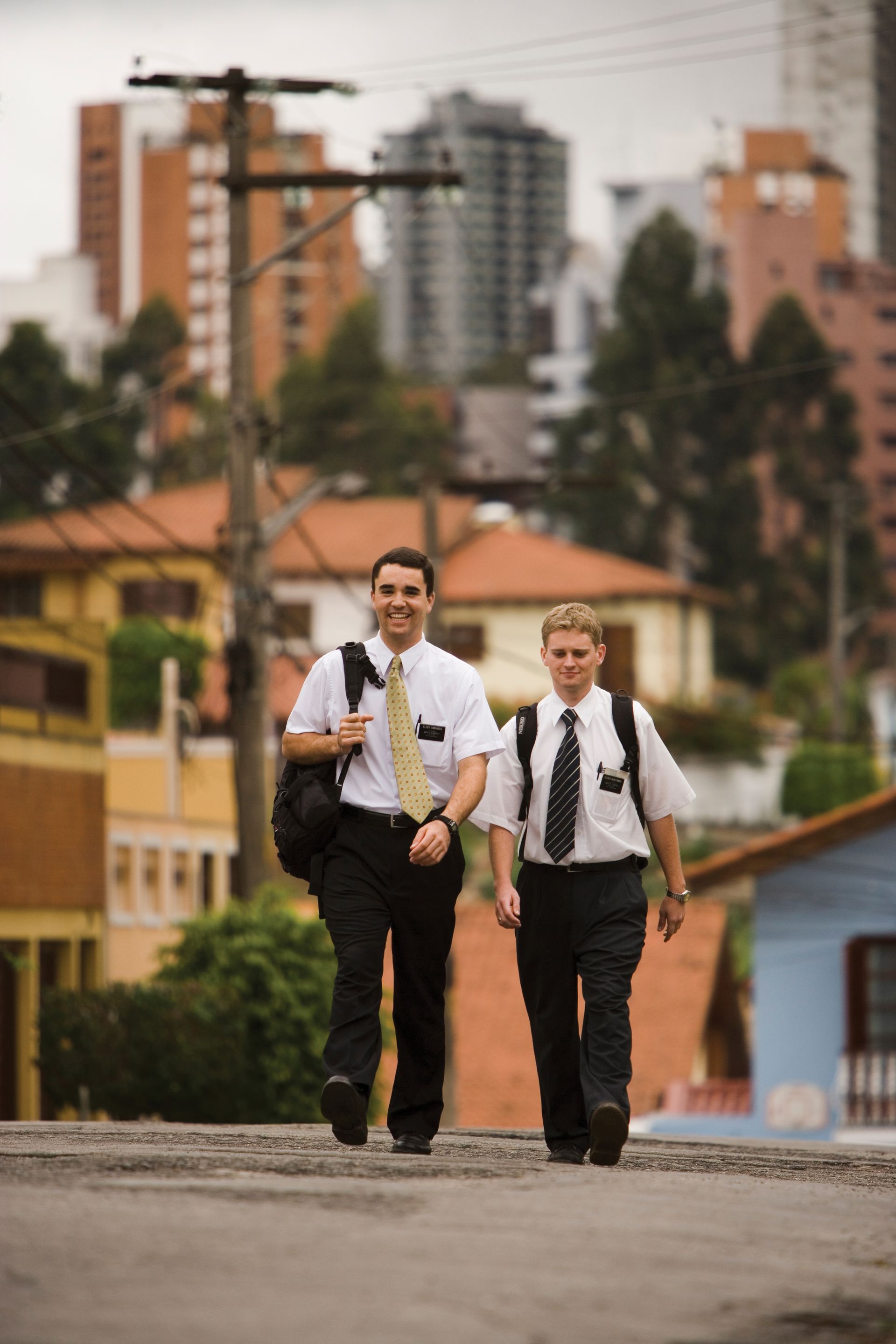 Two elder missionaries walking in São Paulo, Brazil.
