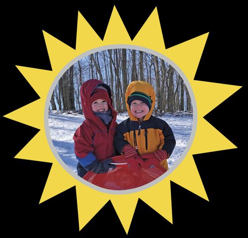 two boys in coats outside