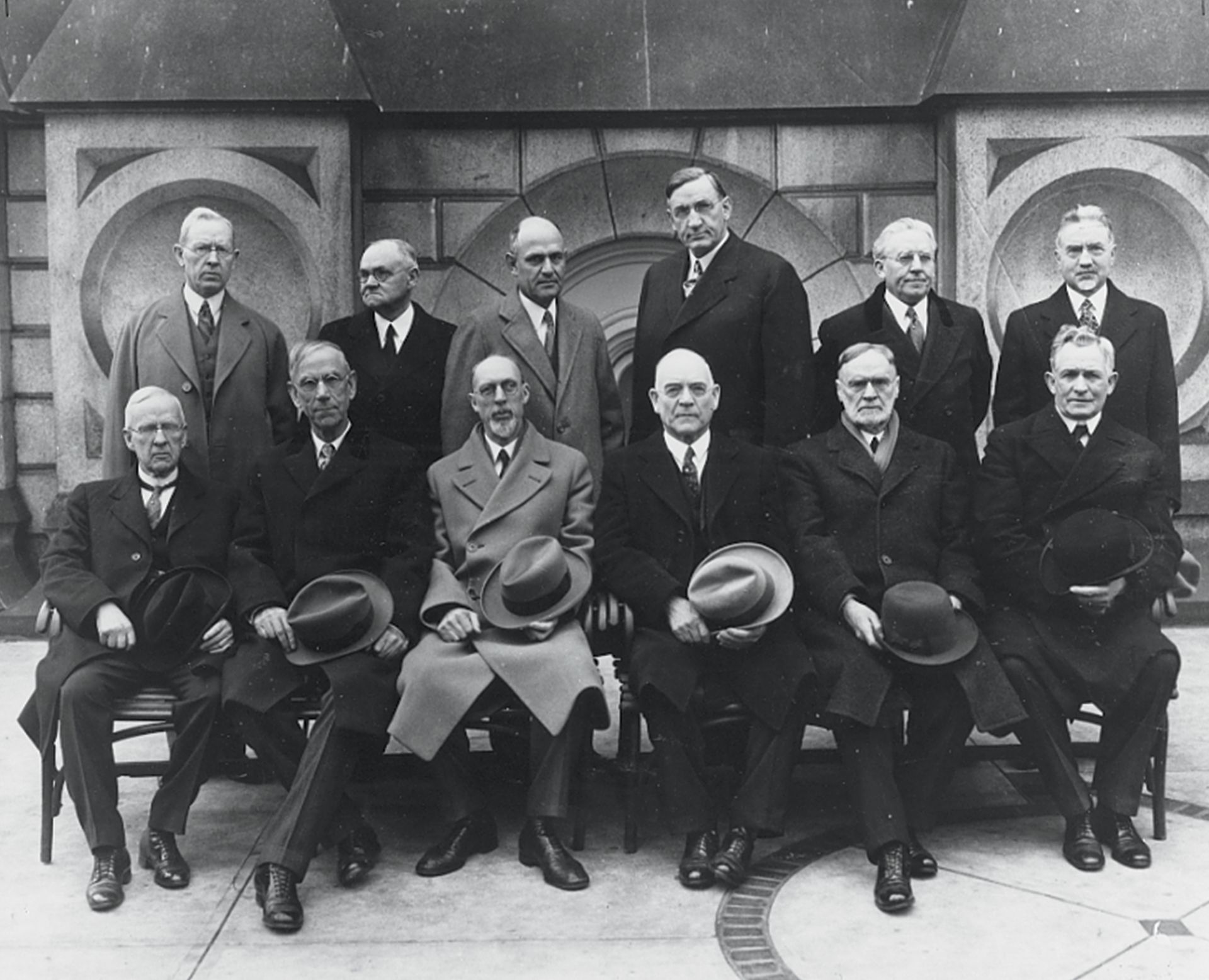 The Quorum of the Twelve Apostles in 1921. Standing, left to right: Joseph Fielding Smith, James E. Talmage, Stephen L Richards, Richard R. Lyman, Melvin J. Ballard, and John A. Widtsoe. Seated, left to right: Rudger Clawson, Reed Smoot, George Albert Smith, George F. Richards, Orson F. Whitney, and David O. McKay. Teachings of Presidents of the Church: George Albert Smith (2011), xx