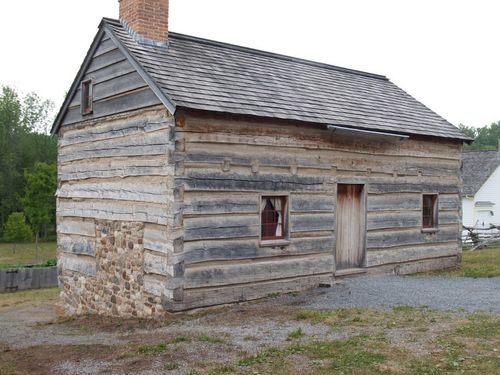 A photo of the wooden Smith family cabin.