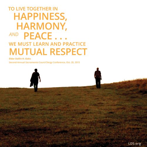 An image of two men standing on a hillside with these words: "To live together in happiness, harmony, and peace … we must learn and practice mutual respect."