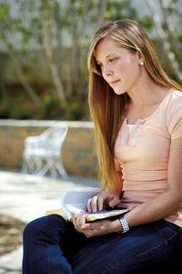 young woman reading scriptures