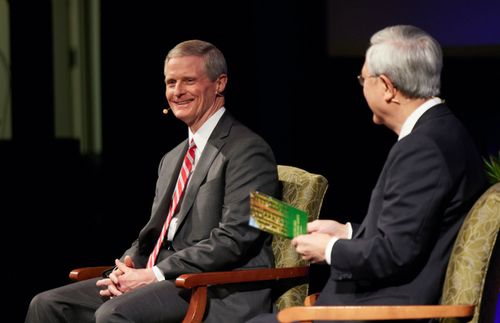 Elders David A. Bednar and Gerrit W. Gong at a conference on Islam