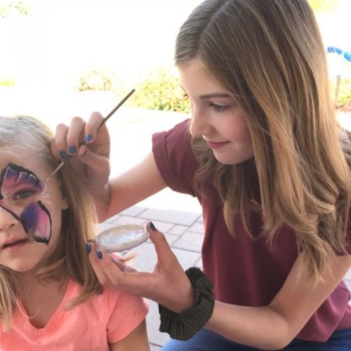 young woman face painting