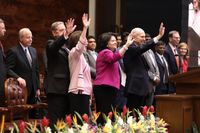 Russell M. Nelson and Wendy Nelson wave to a crowd in India.