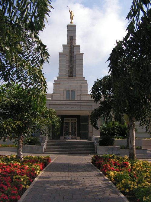 The path leading to the front door of the Accra Ghana Temple, as seen from the outside during the day.