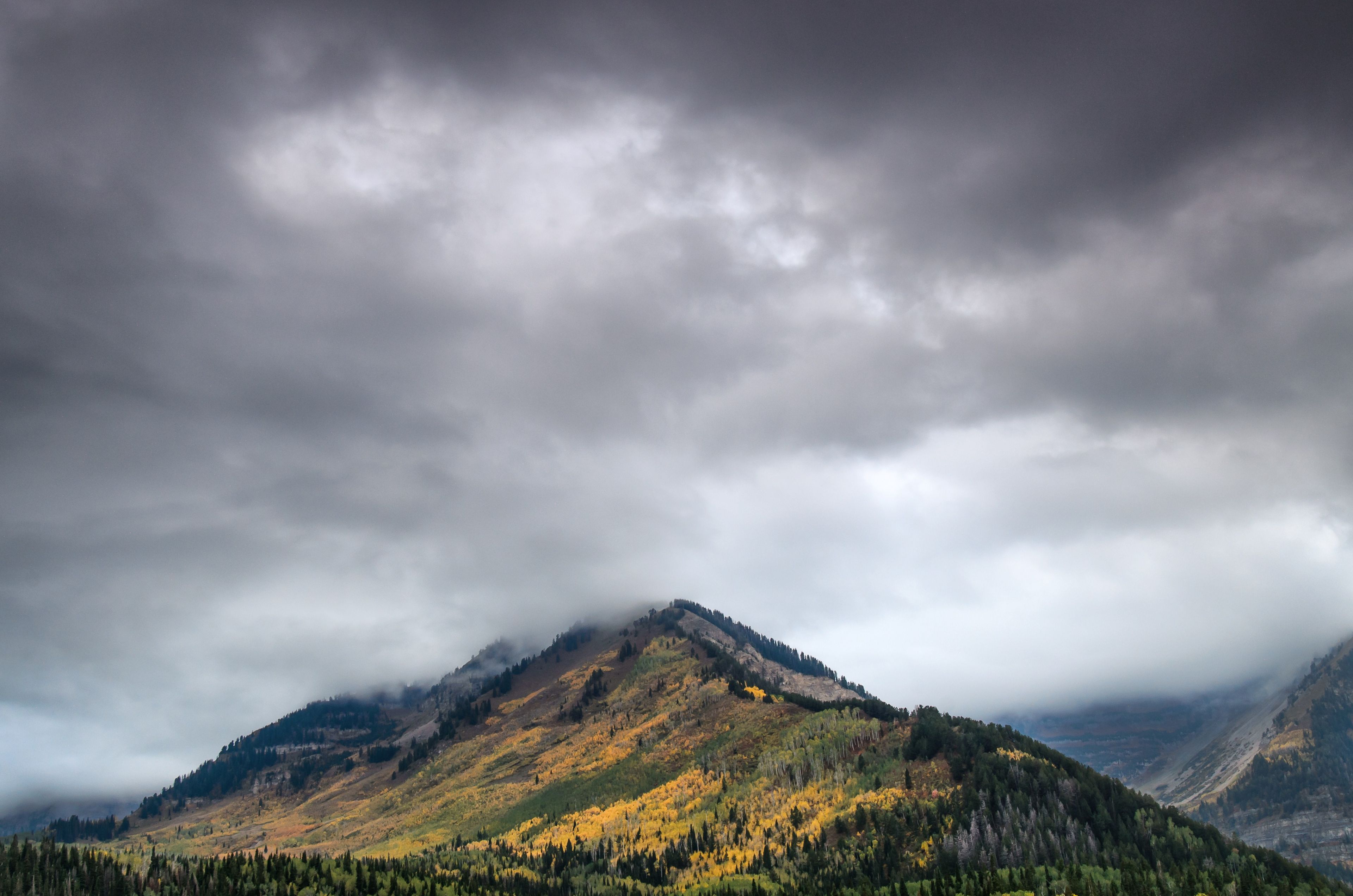 Alpine Loop in autumn with storm clouds.