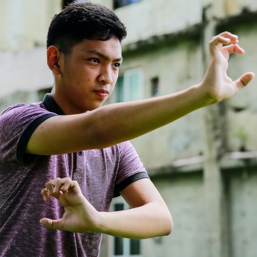 young man practicing martial arts