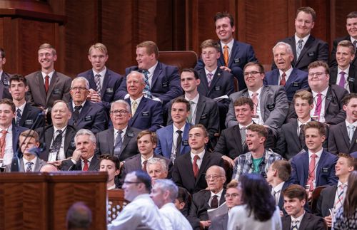 smiling missionaries at choir rehearsal