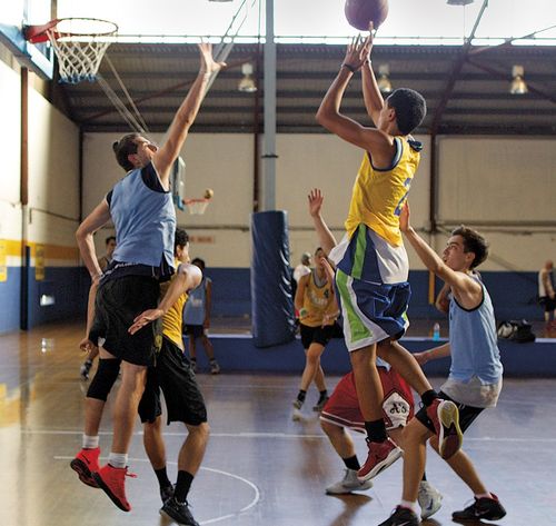 men playing basketball