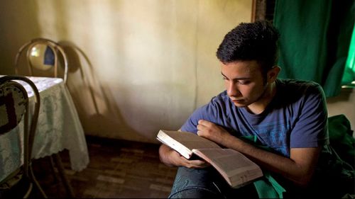 youth studying their scriptures