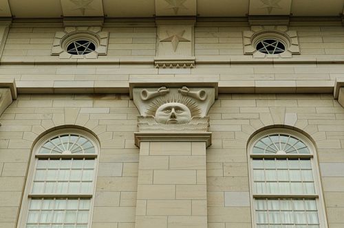 A detail of the sunstone and windows that line the outer walls of the Nauvoo Illinois Temple.